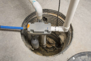 sump pump installed in basement of home